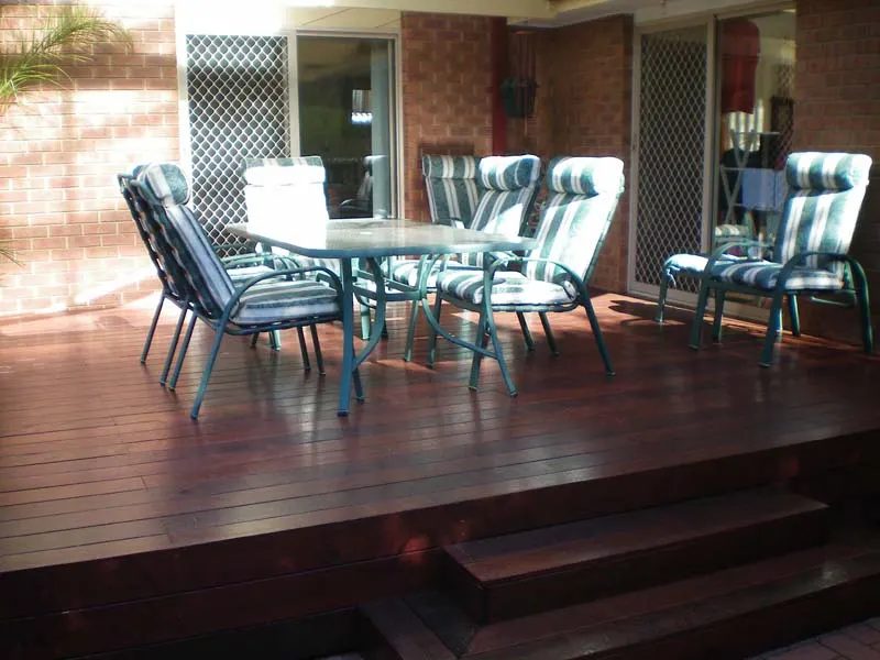 Deck with steps, seating and a covered pergola